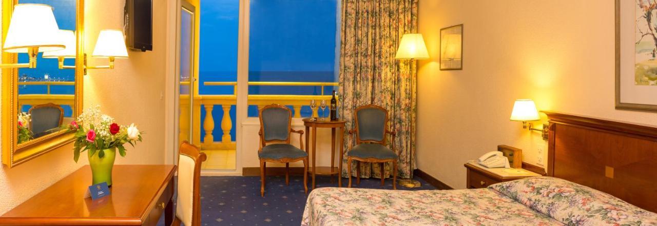 Corfu Palace Hotel Exterior foto A room at the hotel