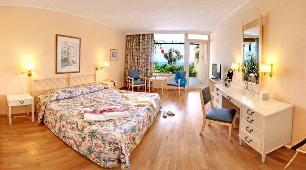 Corfu Palace Hotel Exterior foto A typical hotel room